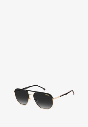 Occhiali da sole con gradiente nero, montatura in metallo dorato, design angolare e steli in plastica nera con strisce rosse e bianche.