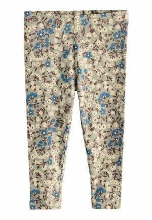 Leggings floraux avec une texture côtelée. Base vert clair avec des fleurs bleues et brunes, taille élastique et design de jambe fuselée.
