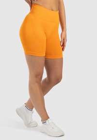 Smilodox EDINA SEAMLESS SCRUNCH - Tights - orange
