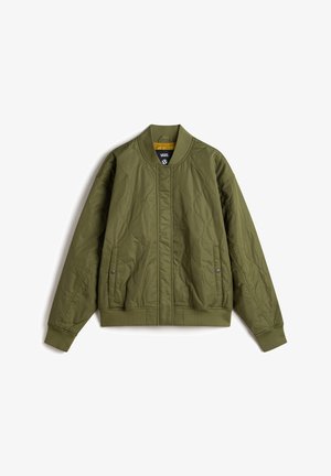 Olive green quilted bomber jacket with a ribbed collar, elastic cuffs, two side pockets, and a yellow inner lining. Features Vans branding.