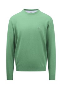 Maglione verde lavorato a maglia con maniche lunghe, collo tondo e logo di un albero nero sul petto. Texture liscia con polsini e orlo a costine.