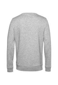 Sudadera gris con cuello redondeado, mangas largas y puños y dobladillo acanalados. Tejido suave y texturizado con un diseño liso.