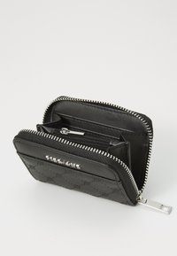 Black zippered wallet made of textured leather with silver hardware, featuring two compartments, card slots, and a patterned exterior.