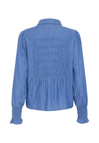 Sininen chambray-paita, jossa on kauluksellinen kaula-aukko, korsettiselkätyyli ja kootut hihansuut. Pitkät hihat ja rento istuvuus, sekä hienovarainen tekstuuri.