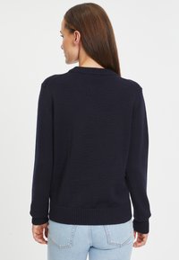 Rossignol Sweter