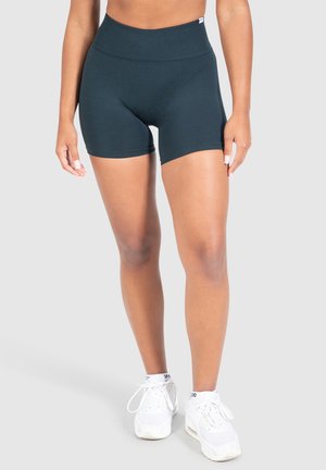 High-waisted donkergroene shorts met een aansluitend ontwerp, gemaakt van rekbaar materiaal. Voorzien van een naadloze tailleband en een lengte tot halverwege de dij.