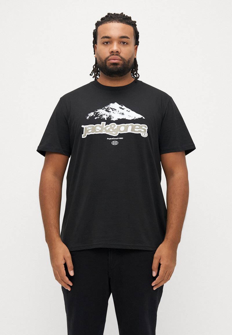 Μαύρο βαμβακερό t-shirt με λευκό γραφικό βουνού και κείμενο λογότυπου. Κοντά μανίκια, λαιμόκοψη τύπου crew, χαλαρή εφαρμογή, λεία υφή.