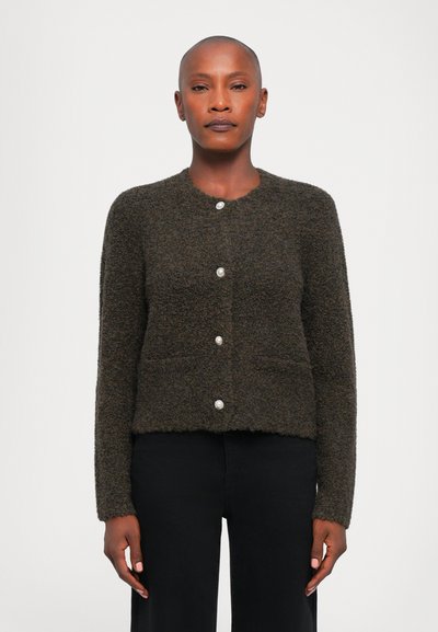 Dark green textured cardigan with a round neckline, five shiny buttons, and two front pockets. Soft fabric and cropped design.