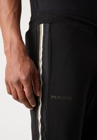Antony Morato TROUSERS METAL EFFECT RUBBER LOGO - Pantalon de survêtement - black