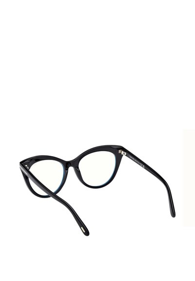 Lunettes œil de chat noires avec une finition brillante, verres clairs et accents bleus sur les bords intérieurs. Branches fines et élégantes avec un détail en métal argenté.