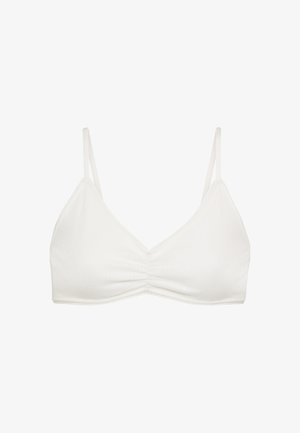Weißes Bralette mit dünnen Trägern, nahtlosem Design und gerafftem Mittelpunkt. Hergestellt aus weichem Stoff mit subtilem Rippenmuster und Spitzenbesatz.