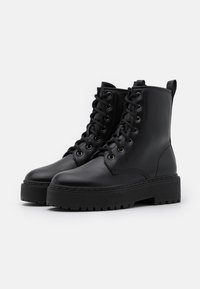 Even&Odd Stivaletti con plateau - black
