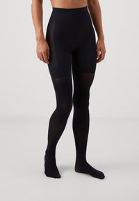 Svarta ogenomskinliga strumpbyxor med hög midja, med en sömlös design och en mjuk textur, som sträcker sig ner till fötterna utan tår.