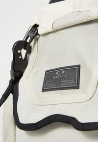 Oakley KITCHEN SINK UNISEX - Potovalni nahrbtnik - mist