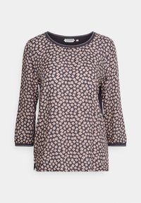 Maglietta a maniche lunghe di colore blu navy con un motivo geometrico di forme rosa chiaro e beige, collo rotondo e spacchi laterali all'orlo.
