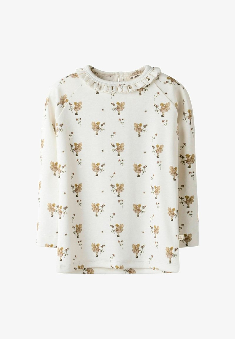 Světle krémový top s dlouhým rukávem, který má volánkový výstřih a květinový vzor se zlatými akcenty a malými ilustracemi. Měkká textilie.