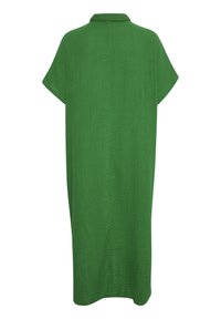Abito verde fino al ginocchio con maniche corte, colletto a V e un tessuto leggero e texturizzato. Design semplice e dalla vestibilità ampia.