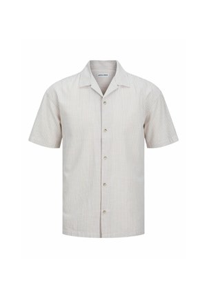 Lühikest varrukat omav heledat beežist särk, millel on peened vertikaalsed triibud, klassikaline krae ja ees nupud. Pehme kangastekstuuri.