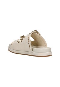 Sandali infradito in pelle beige con decorazioni in oro, un design con ritagli e una suola imbottita con una base in gomma marrone chiaro.
