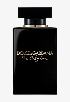 Flacon de parfum rectangulaire noir avec texte doré "Dolce & Gabbana The Only One" et grand bouchon rectangulaire noir.