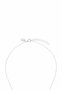 Silverfärgad kedjearmband med en ömtålig länkdesign, säker lobsterklämma och en justerbar förlängningskedja för anpassningsbar längd.