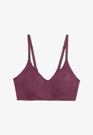 Lila bralette i en mjuk, elastisk tyg. Har justerbara axelband och en bred midja, designad för komfort och stöd. Utan undertrådar.