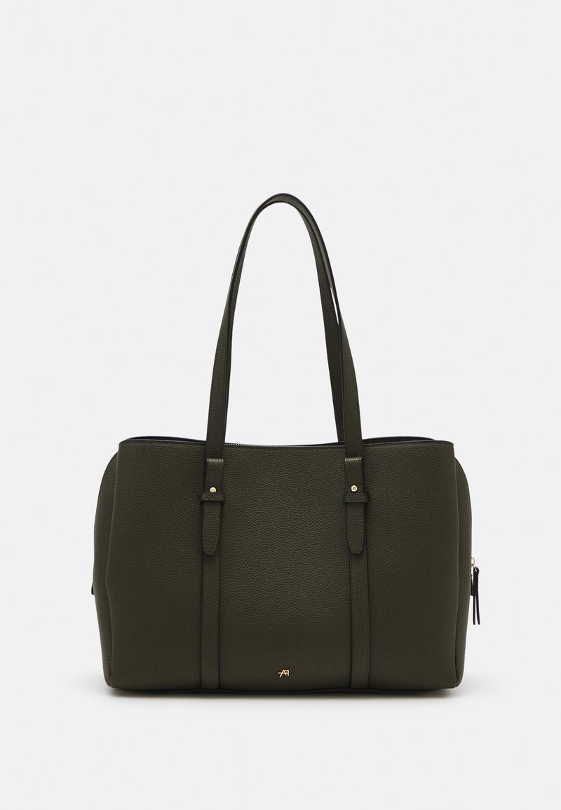 Sac fourre-tout vert foncé texturé avec deux longues poignées, des accents dorés et une fermeture zippée avec une poche latérale. Design simple et structuré.
