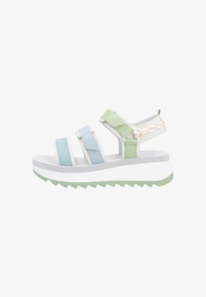 Strappy sandals featuring light green, blue, and white elastic bands, a thick white platform sole, and a textured mint-green bottom.