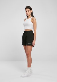 Karl Kani Shorts - black
