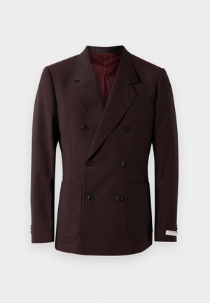 Veste bordeaux à double boutonnage en tissu texturé avec des boutons noirs, revers crantés et deux poches avant. Doublure intérieure en maroon.