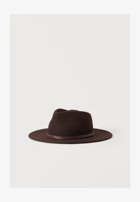 Избран, brown