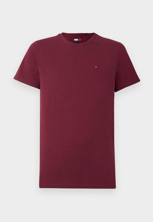 T-shirt à manches courtes de couleur marron avec un petit logo drapeau Tommy Hilfiger sur la poitrine gauche, sur fond blanc.