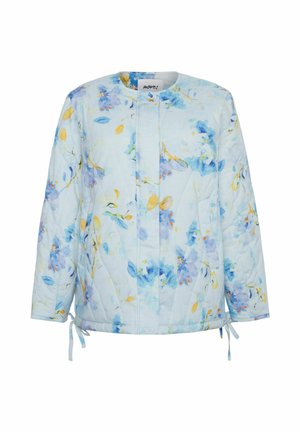 Quilted jacket in light blue with floral patterns in shades of blue and yellow. Features ties at the hem and a round neckline.