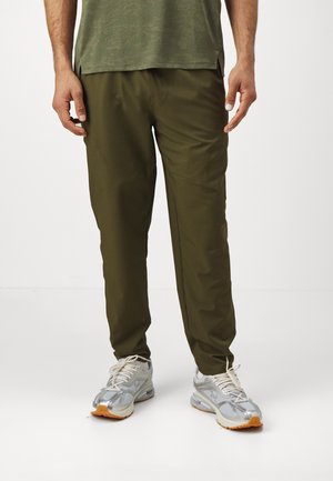 UNSTOPPABLE TAPERED PANTS - Pantalon de survêtement - expedition green/black