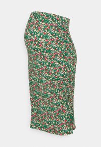 Floral green skirt with a fitted design, featuring pink, yellow, and white flowers, textured fabric, and side ruching detail.