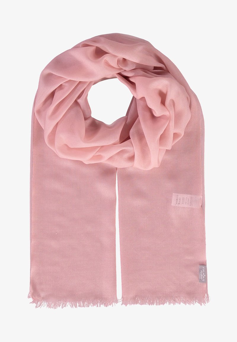Écharpe rose clair en matériau doux et léger. Elle présente un bord frangé et une étiquette attachée avec des instructions d'entretien.