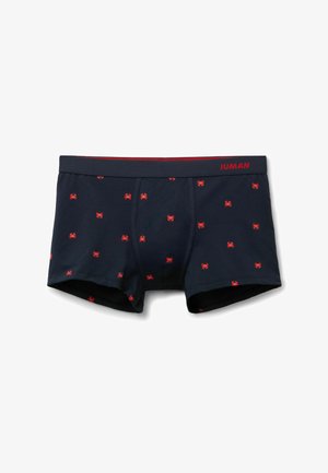 Marineblauwe boxershorts met rode krabpatronen en een donkere tailleband met het rode "IUMAN"-logo aan de rechterkant.