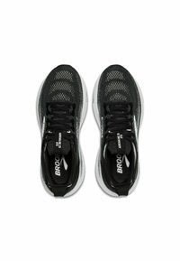 Scarpe da corsa nere con tomaia in rete dal design testurizzato, intersuola bianca e lacci neri. Marchio sulla linguetta e sul lato.