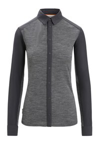 Camicia a maniche lunghe con bottoni, caratterizzata da un corpo grigio mélange con pannelli grigi scuri sulle spalle e dettagli con bottoni lungo la bottoniera.