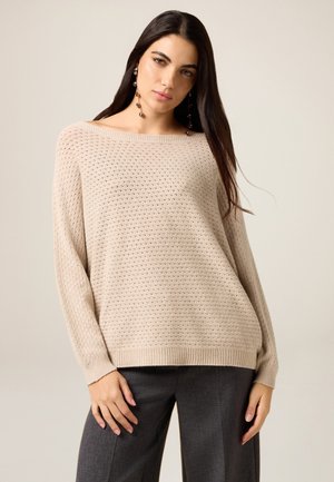 Stickad tröja - beige