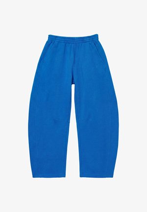 Pantalon de survêtement bleu à taille élastique avec poches latérales et coupe décontractée, posé à plat sur fond blanc.