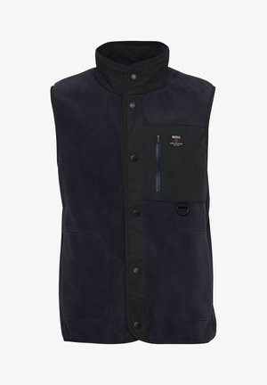 Navyblauwe fleece vest met hoge kraag, zwarte nylon accenten, voortassen en een met rits afsluitbare borstzak. Voorzien van drukknoopsluiting.