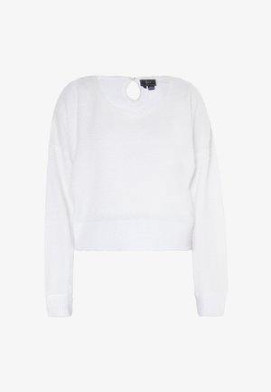 Weißer, verkürzter Pullover aus weichem, flauschigem Material. Hat lange Ärmel und einen runden Ausschnitt mit einer Schlüssel-Ausschnittöffnung auf der Rückseite.