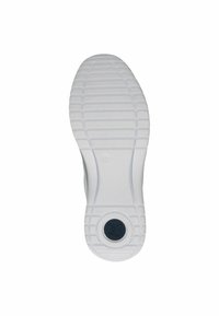 Fehér sneaker talp, textúrázott tapadásmintával, kör alakú logó a sarok közelében, valamint sima felületek a fokozott kényelem és flexibilitás érdekében.