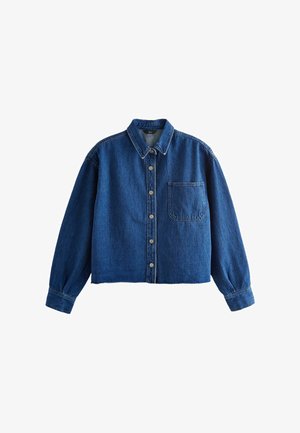 Denim shirt in dark blue, featuring a collar, long sleeves, front buttons, and a chest pocket. Slightly cropped design with a plain texture.