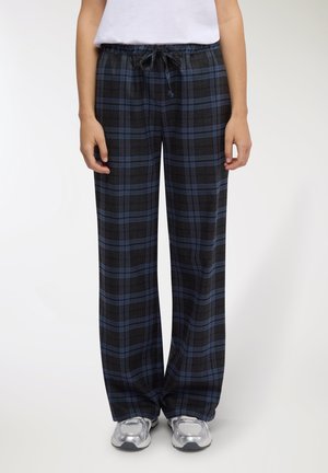 - Spodnie materiałowe