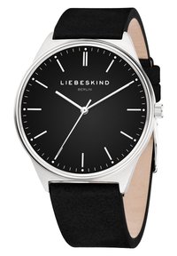 Schwarz analoger Uhr mit einem silbernen Edelstahlgehäuse, minimalistischen weißen Stundenmarkierungen und einem schwarzen Wildlederarmband.