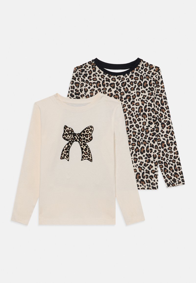 Two long-sleeve shirts: one in cream with a black leopard print bow, the other with a brown and black leopard pattern, both with round necklines.