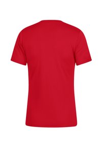T-shirt rossa a maniche corte realizzata in tessuto morbido, caratterizzata da un classico scollo rotondo e un taglio dritto sul fondo.