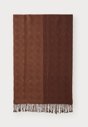 Xale tecido com padrão castanho e cor graduada, apresentando um design de diamante texturizado e extremidades com franjas. Material suave e quente.